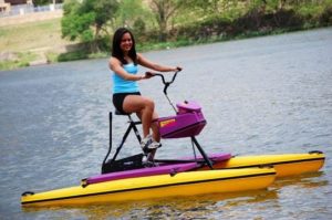 Girl exercising on a purple Hydrobike